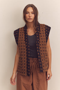 Quilted tie waist vest