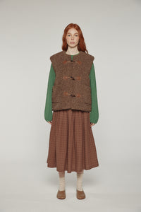Reversible toggle button vest